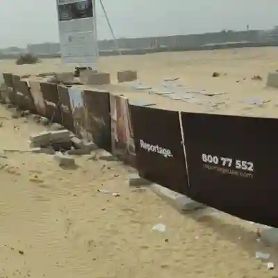 Construction site fencing installed in Abu Dhabi and Dubai providing secure temporary barriers around an active building project.